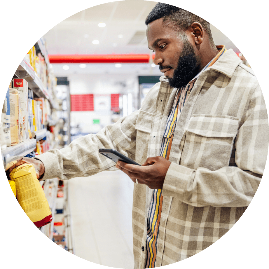 Using Phone in aisle at the store to do research